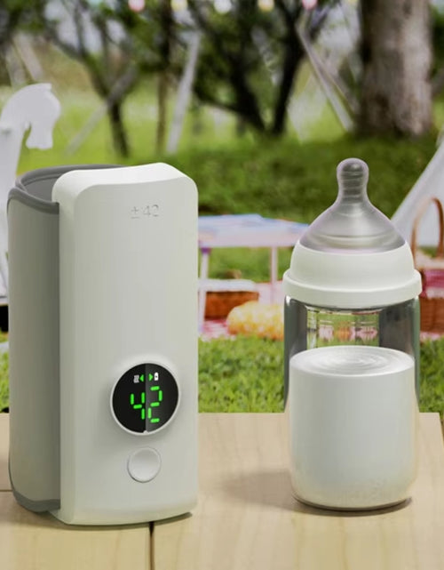 Load image into Gallery viewer, Cordless Portable Baby Bottle Warmer Convenient Travel Essential for Parents
